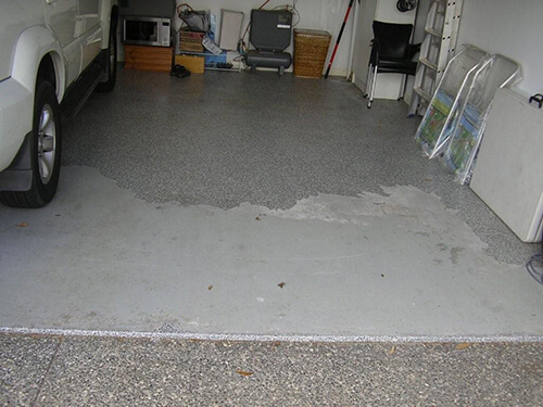 Garage floor coating flaking off.