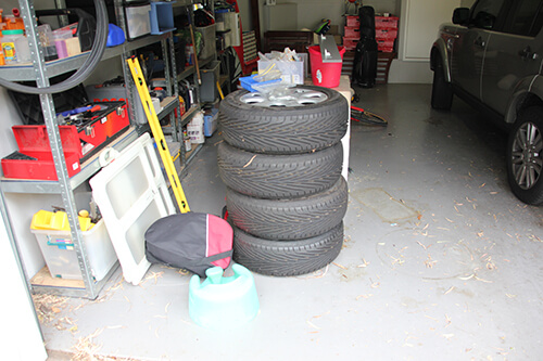Garage crammed with junk.